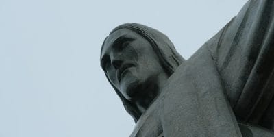 a close up of a statue with a sky background