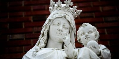 a statue of a woman holding a child